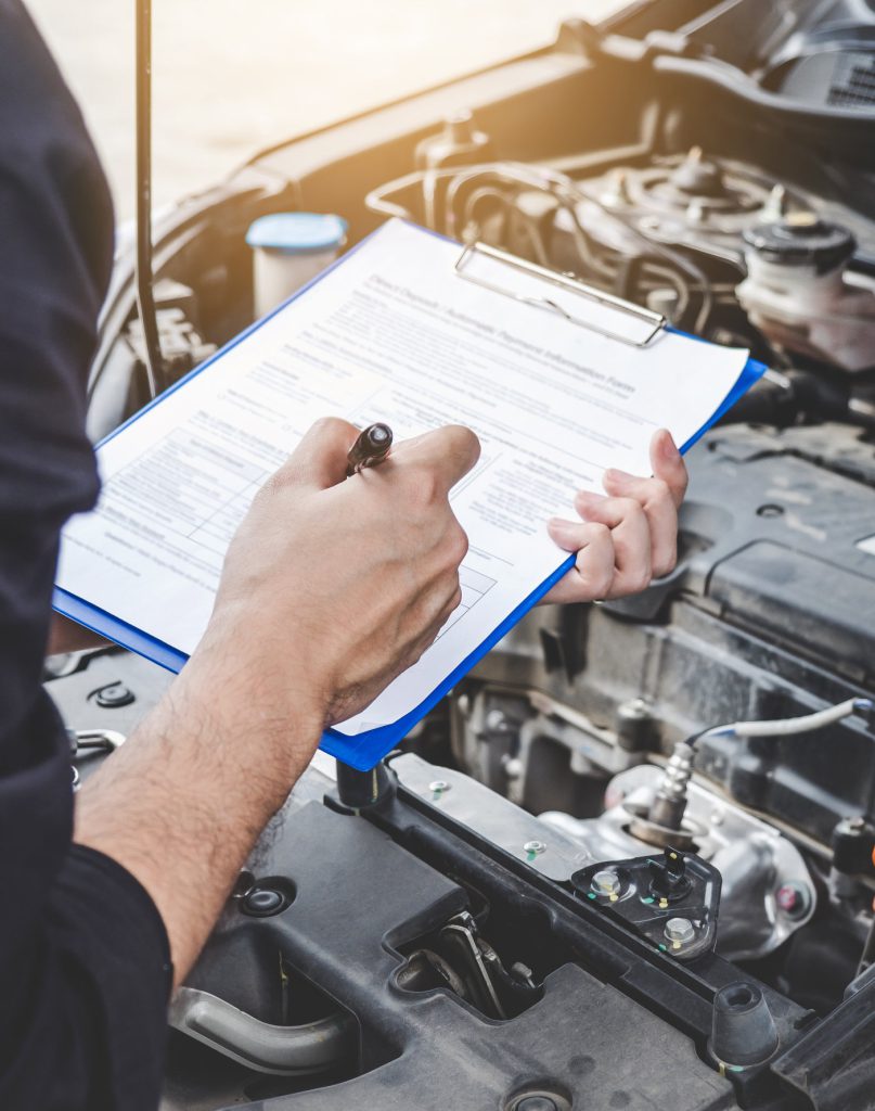 Mechanic checking off a service - Car Servicing Loughborough